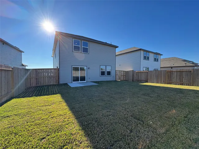 a view of a backyard with a garden