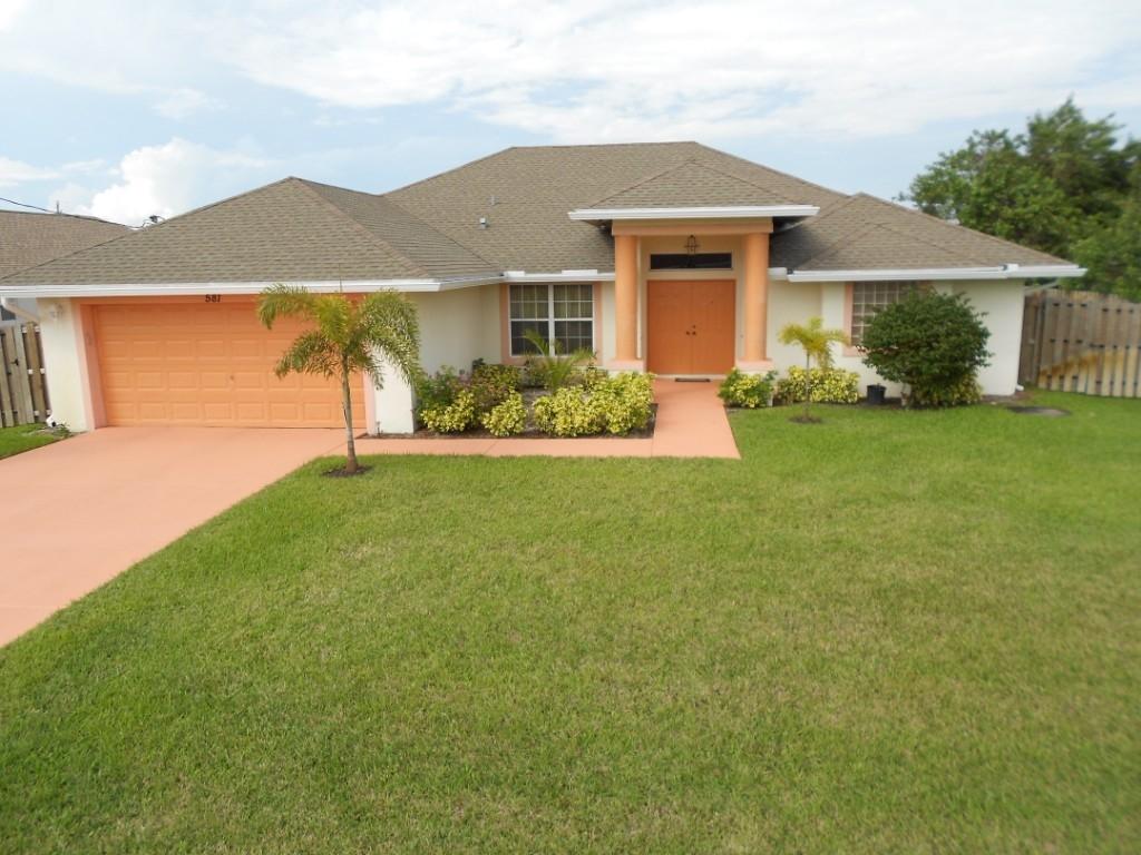 581 Southwest Halkell Avenue Port St. Lucie, FL 34953 - Photo 1 of 30 Front