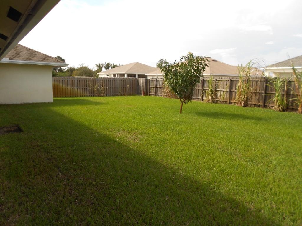 581 Southwest Halkell Avenue Port St. Lucie, FL 34953 - Photo 29 of 30 Back yard