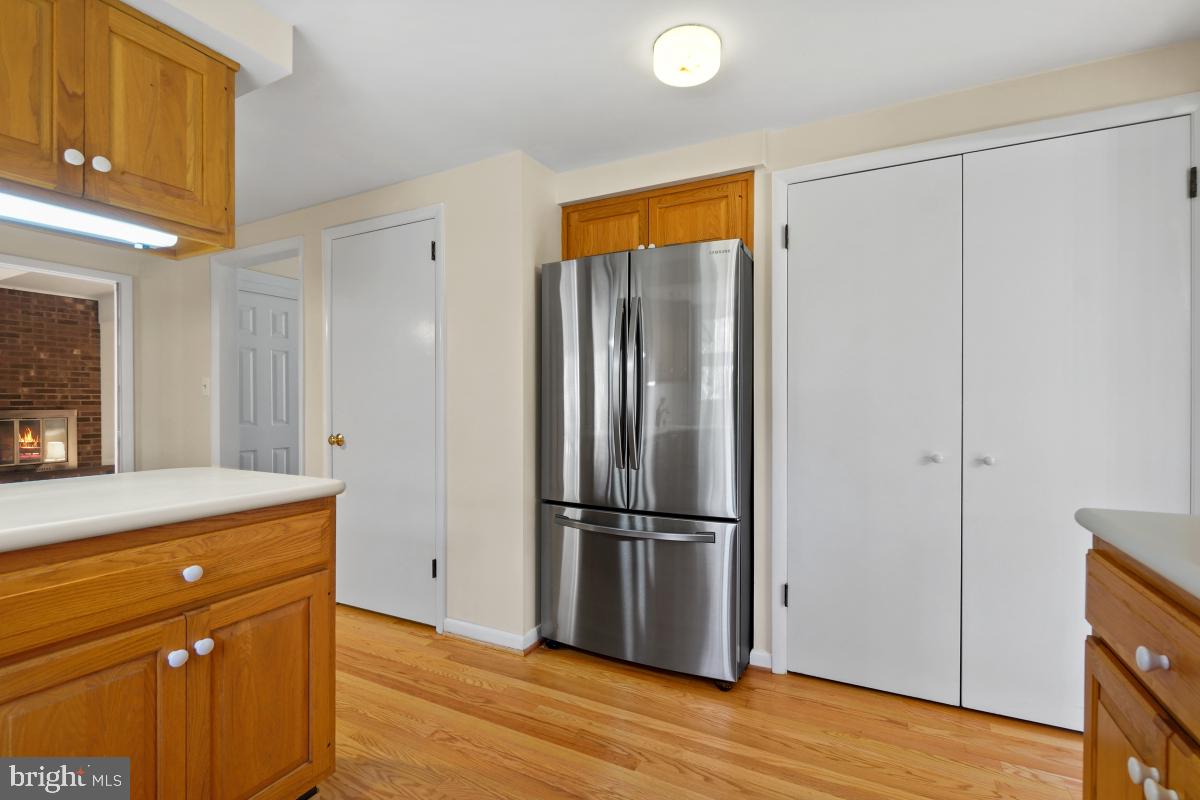 2606 Deerdell Lane Reston, VA 20191 - Photo 13 of 49 a kitchen with stainless steel appliances granite countertop a refrigerator and a sink