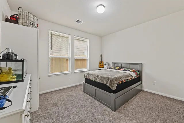 a view of bedroom and window