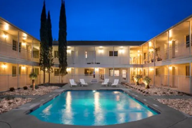 a view of a living room with entryway