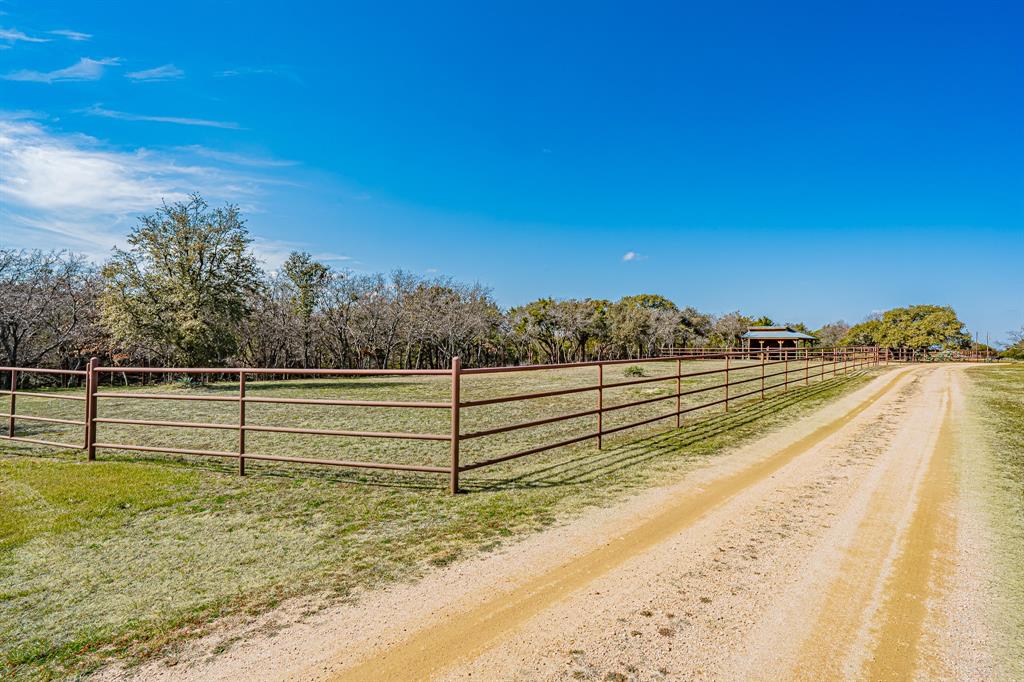 1904 Floyd Road Weatherford, TX 76087 - Photo 17 of 38 Road up to Guest House/Pavillion and Horse Holding Pen