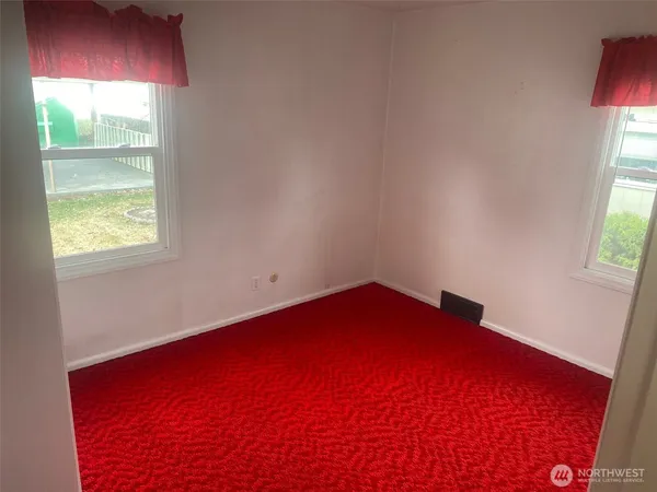 an empty room with a window