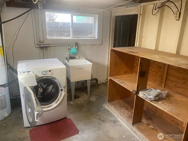 a utility room with dryer and washer