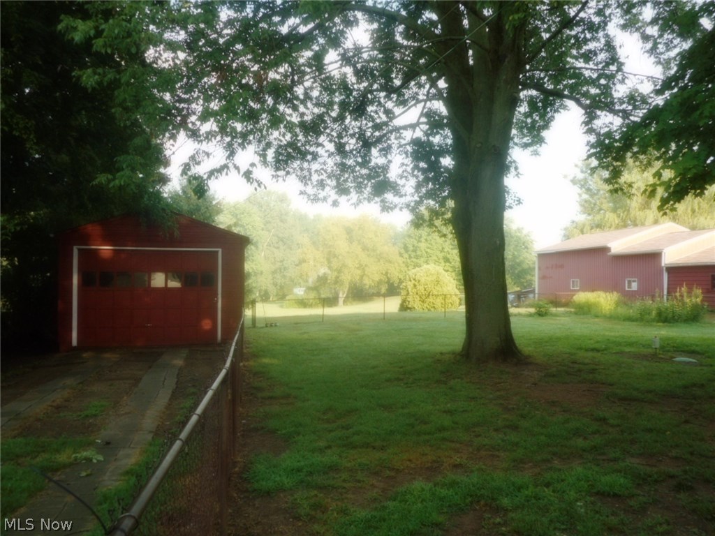 908 Jacoby Road Akron, OH 44321 - Photo 17 of 24 Large outbuilding- with tall ceilings approx. 17.5 x 23
