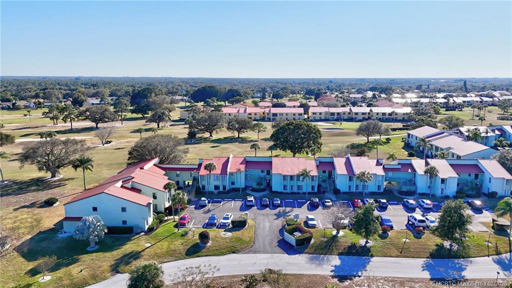 5413 Southeast Miles Grant Road, Unit G206 Stuart, FL 34997 - Photo 38 of 79 an aerial view of a city