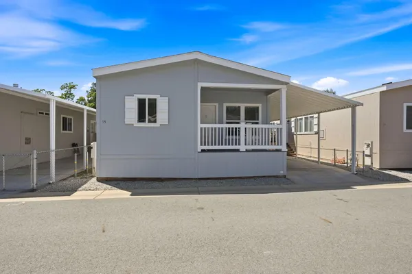 a view of a house with a porch