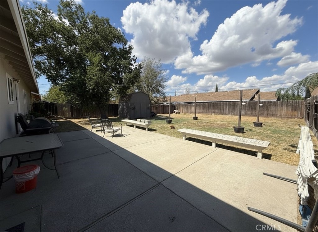 6800 Helton Street Winton, CA 95388 - Photo 18 of 22 a view of a swimming pool with a lounge chair