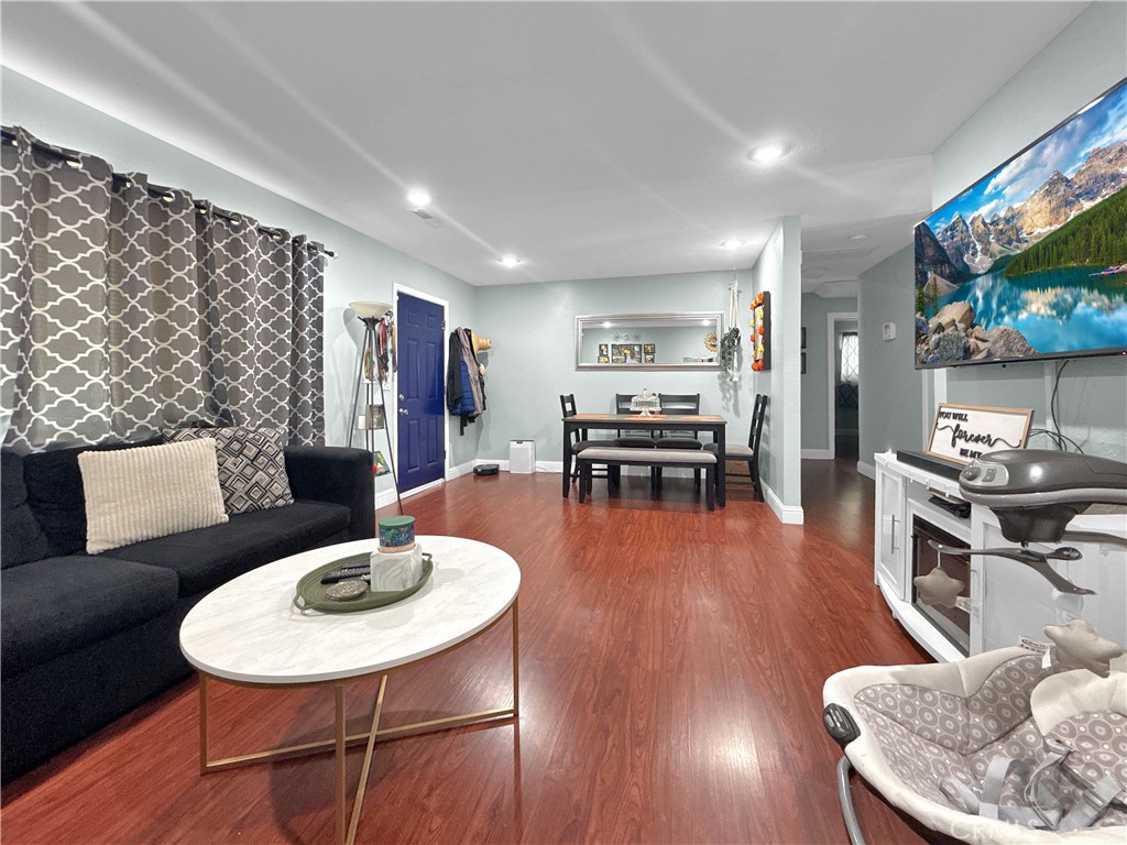 6800 Helton Street Winton, CA 95388 - Photo 8 of 22 a living room with furniture and a wooden floor