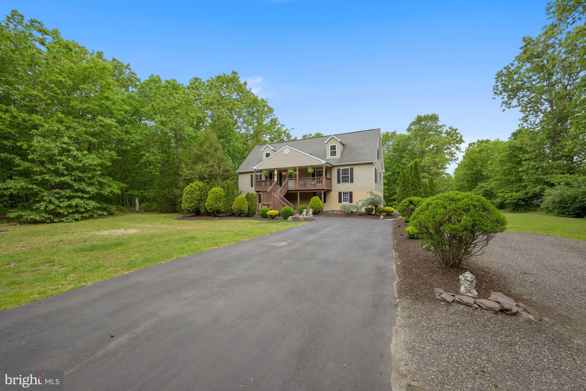 125 Blue Anchor Road Sicklerville, NJ 08081 - Photo 34 of 43 Paved driveway, hardscape walk to side entry door