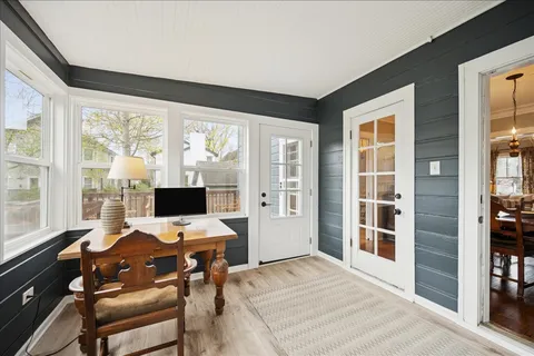 a workspace with furniture and a window