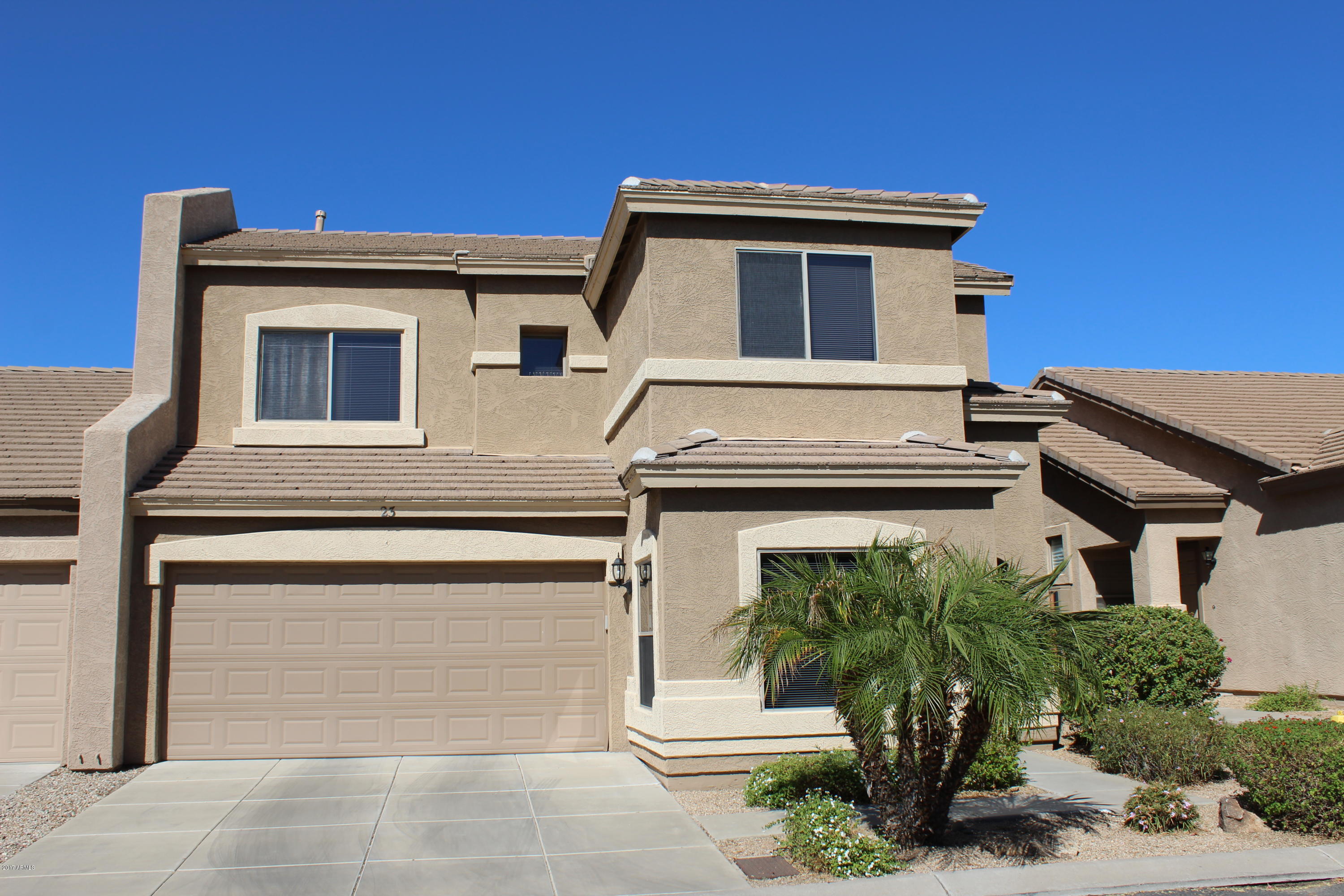 a top view of a house with garage