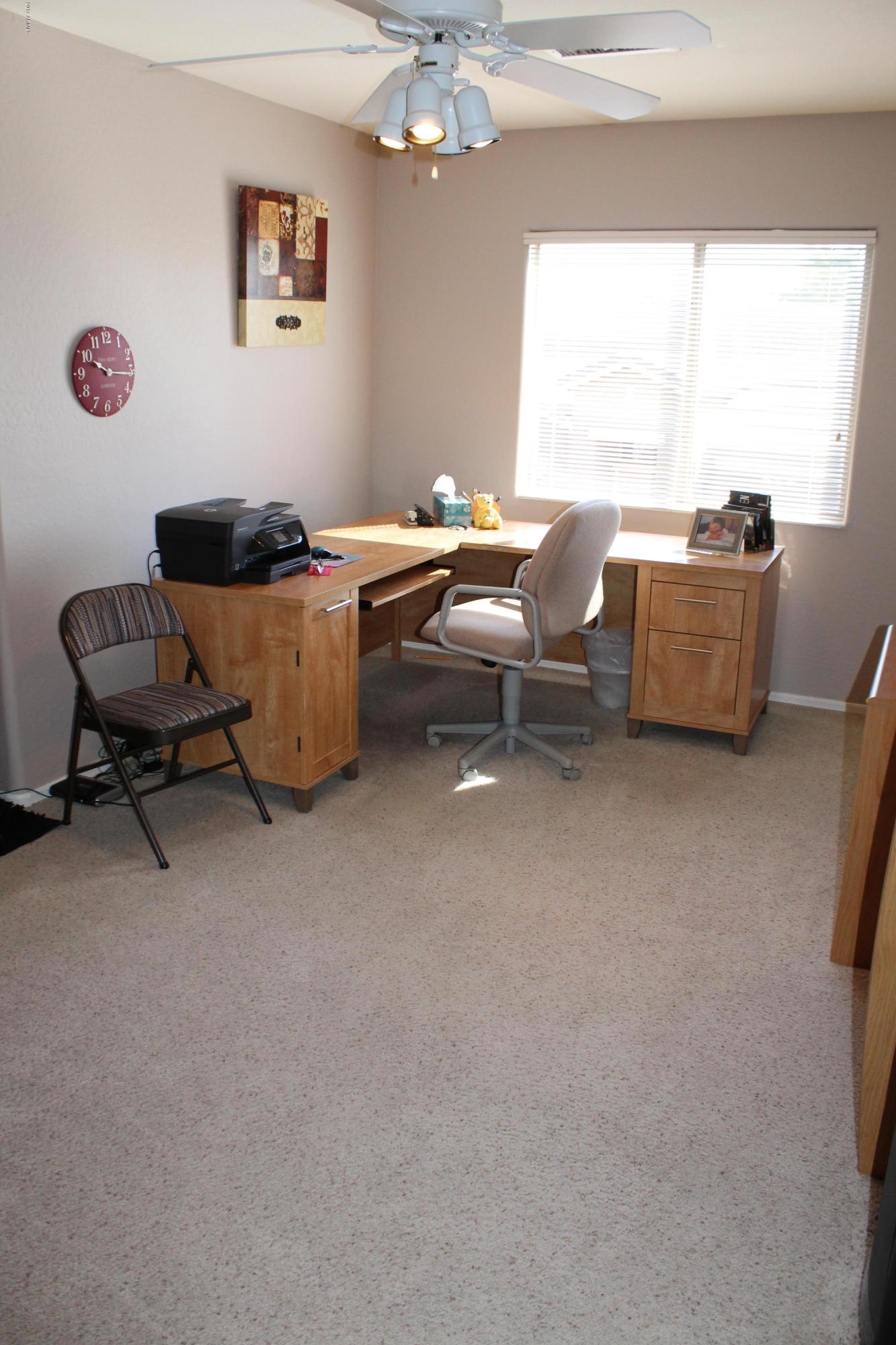 44 South Greenfield Road, Unit 23 Mesa, AZ 85206 - Photo 19 of 28 a living room with furniture and a window