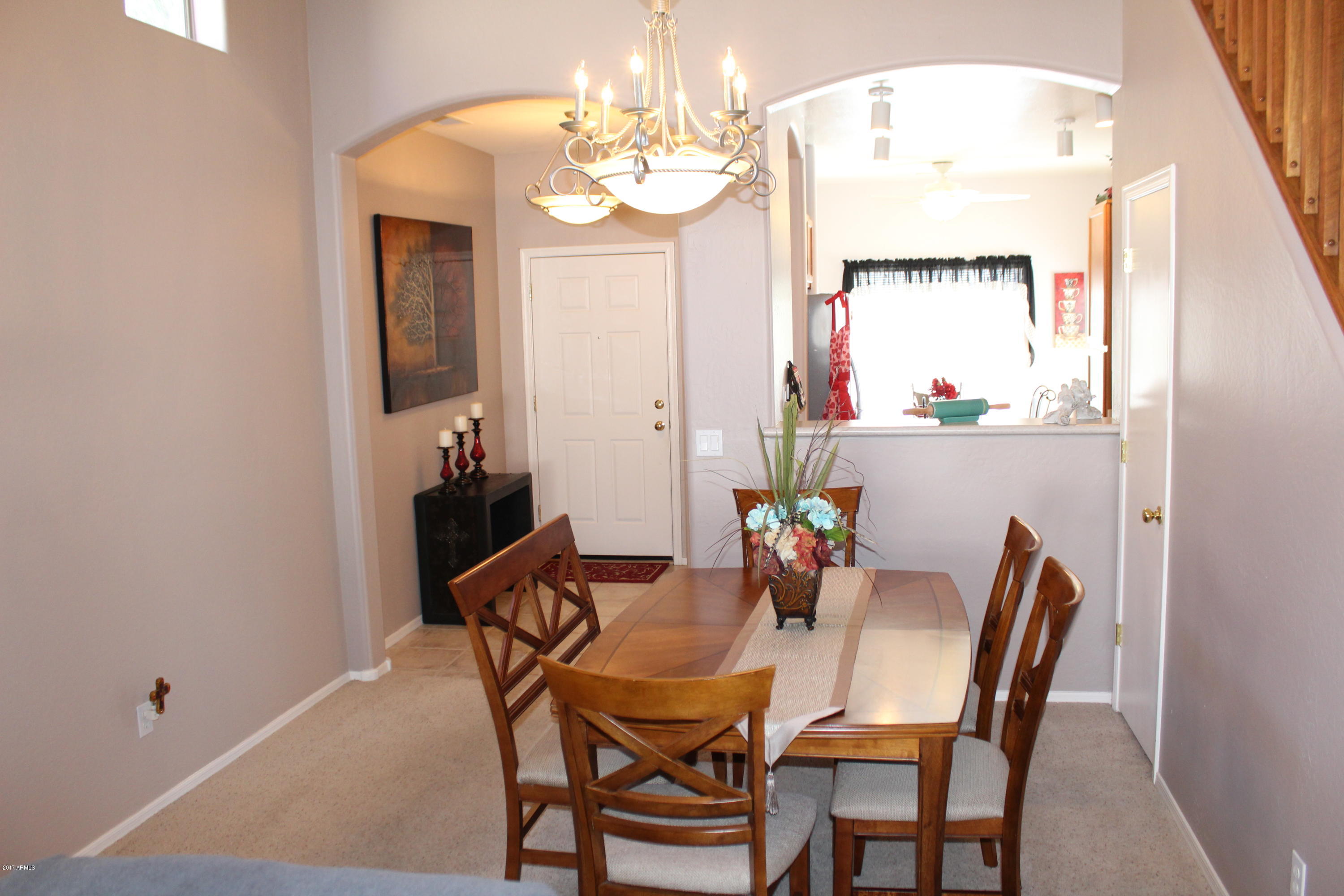 44 South Greenfield Road, Unit 23 Mesa, AZ 85206 - Photo 8 of 28 a view of a dining room with furniture and window