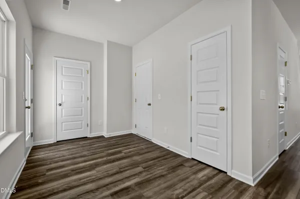 a view of a livingroom with wooden floor