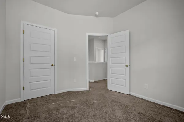 an empty room with closet