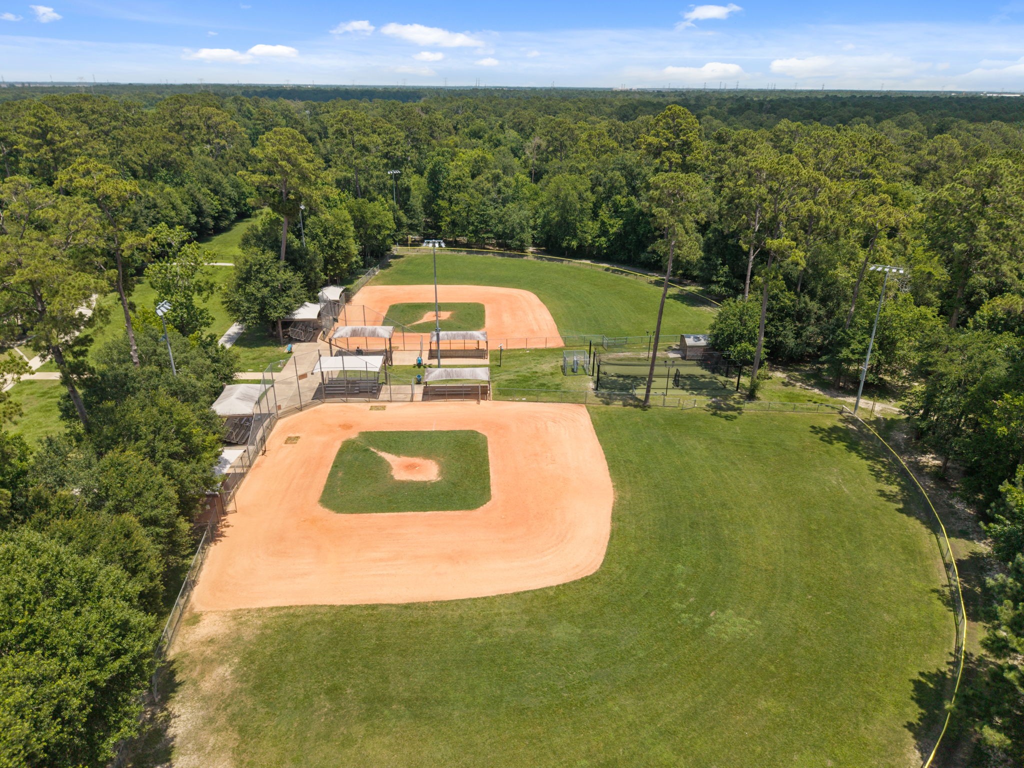 14718 Ramblebrook Humble, TX 77396 - Photo 34 of 38 The Fall Creek Sports Complex offers baseball fields, open play areas, covered pavilions, trails, and gathering spaces.