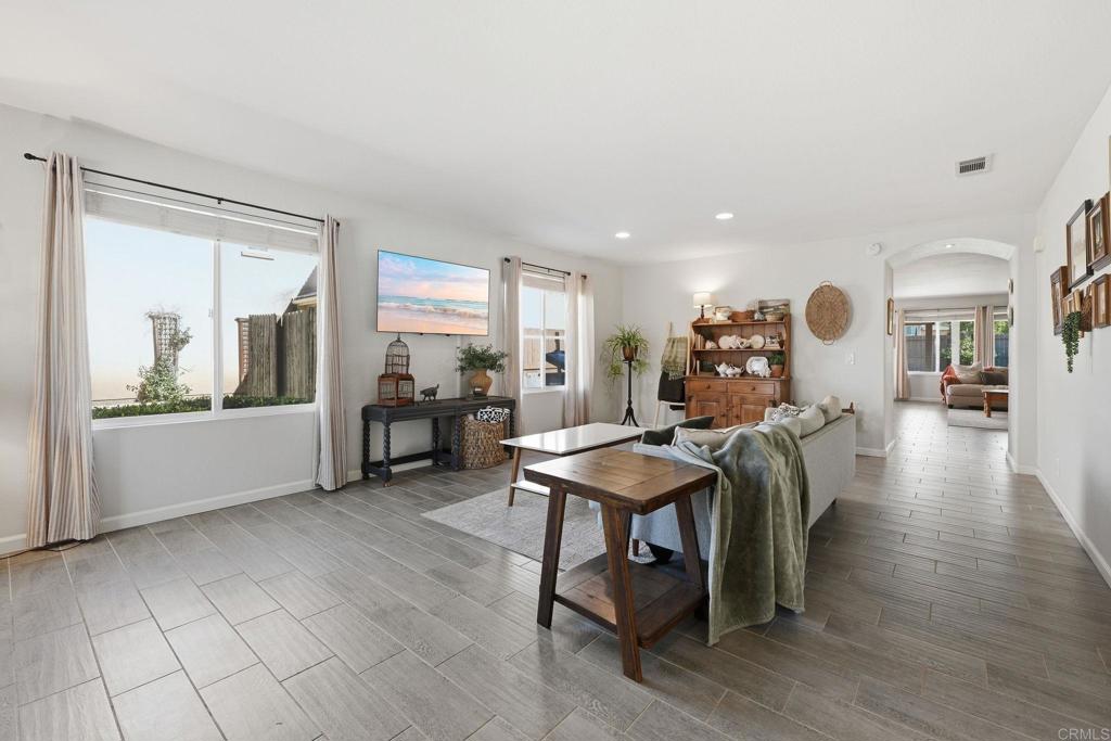 618 Jacks Creek Road Escondido, CA 92027 - Photo 14 of 48 a living room with furniture and a large window
