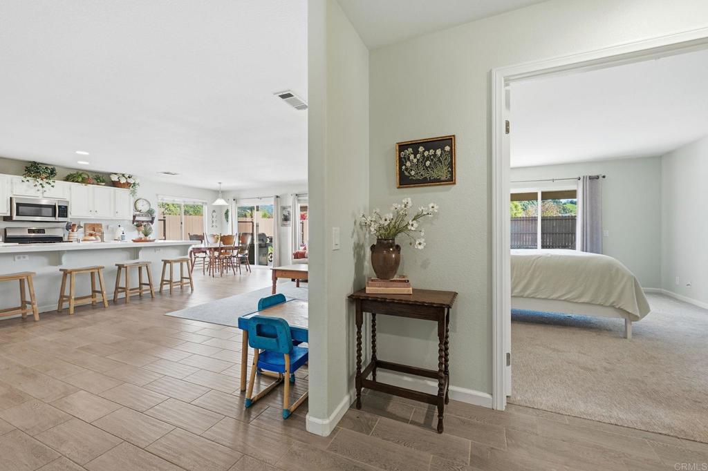 618 Jacks Creek Road Escondido, CA 92027 - Photo 17 of 48 a living room with furniture and a table
