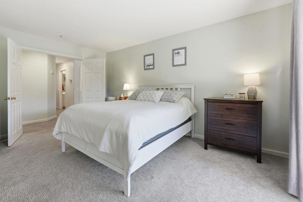 618 Jacks Creek Road Escondido, CA 92027 - Photo 19 of 48 a bedroom with a bed and a night stand