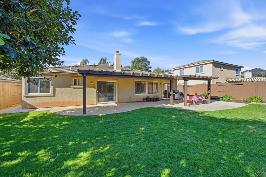 618 Jacks Creek Road Escondido, CA 92027 - Photo 29 of 48 a view of a house with a yard porch and sitting area