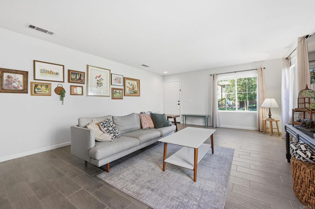 618 Jacks Creek Road Escondido, CA 92027 - Photo 4 of 48 a living room with furniture and a window