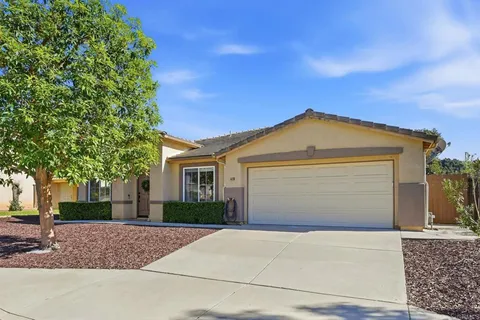 front view of a house with a garage