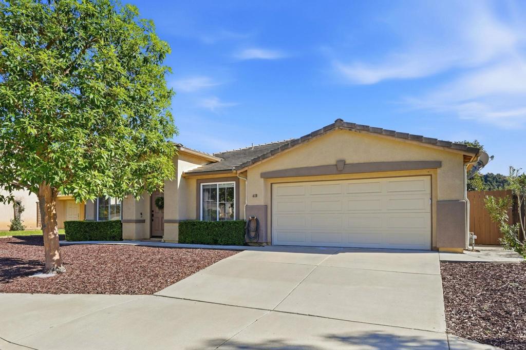 618 Jacks Creek Road Escondido, CA 92027 - Photo 47 of 48 front view of a house with a garage