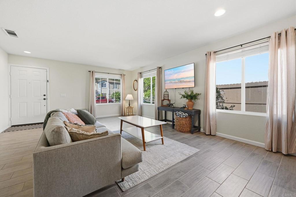 618 Jacks Creek Road Escondido, CA 92027 - Photo 5 of 48 a living room with furniture and a window
