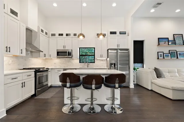 a view of a yard with a house in the background