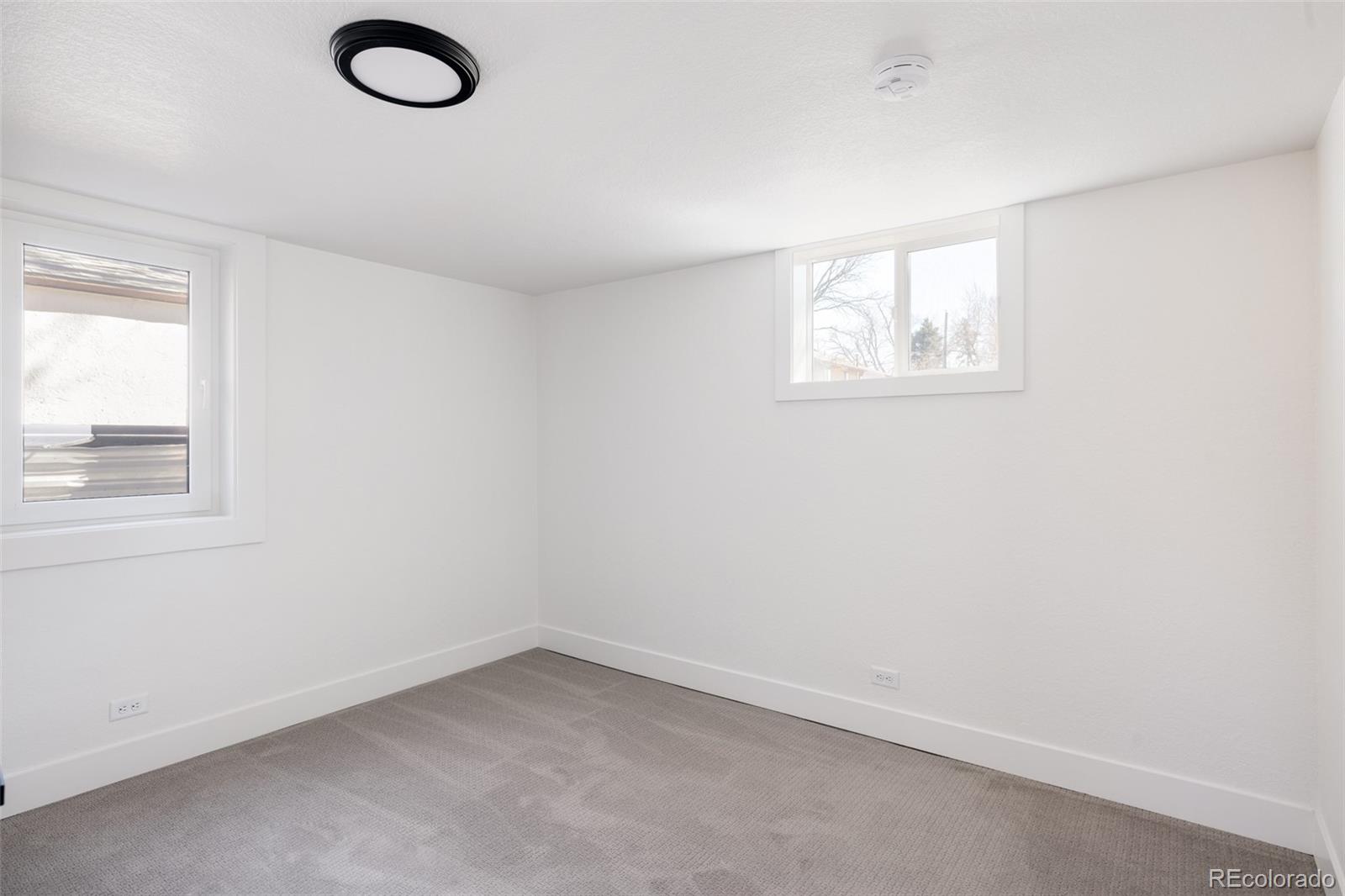 7255 West 35th Place Wheat Ridge, CO 80033 - Photo 30 of 30 an empty room with a window