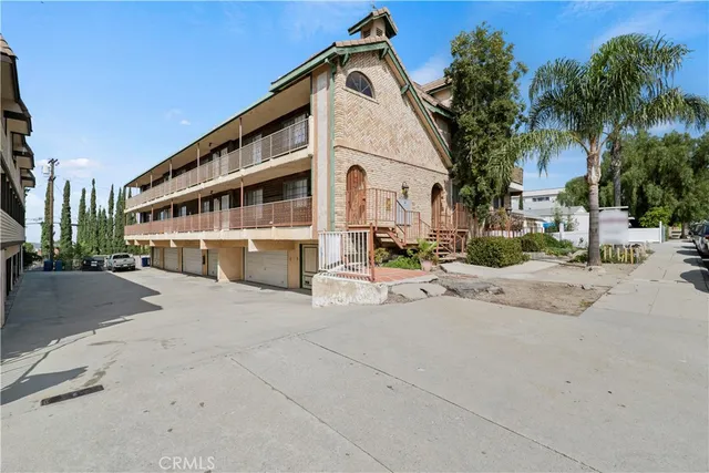 a view of a building with a street