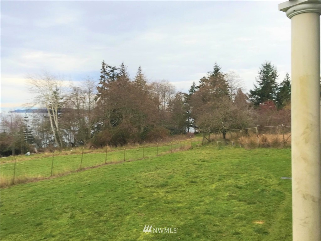 546 Glenwood Inn Road Orcas Island, WA 98245 - Photo 17 of 25 a view of a golf course with a lake