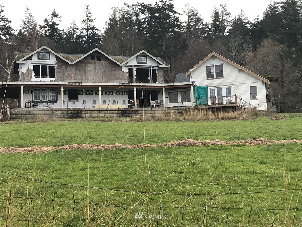546 Glenwood Inn Road Orcas Island, WA 98245 - Photo 23 of 25 a front view of a house with a yard