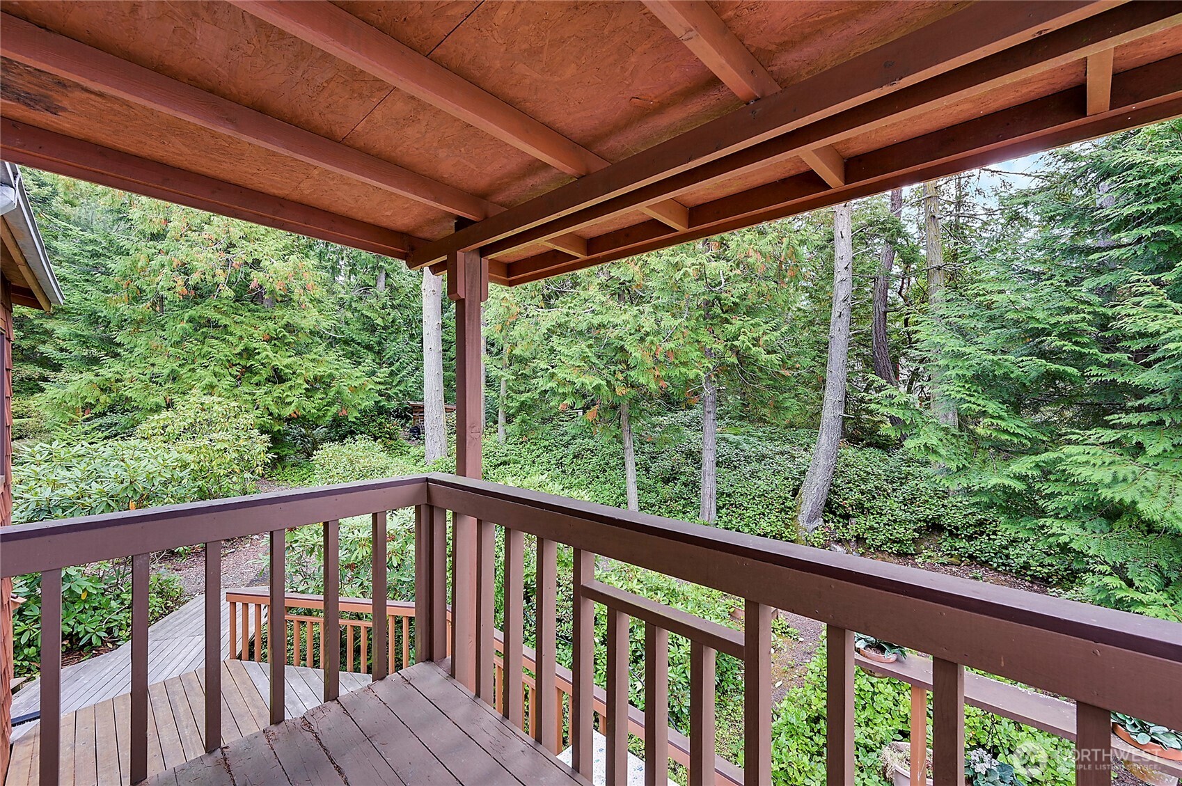 861 Griffith Point Road Nordland, WA 98358 - Photo 31 of 38 a view of a balcony with outside green space