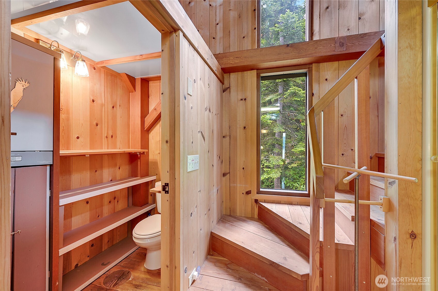 861 Griffith Point Road Nordland, WA 98358 - Photo 32 of 38 a view of a hallway with a large window and an entryway