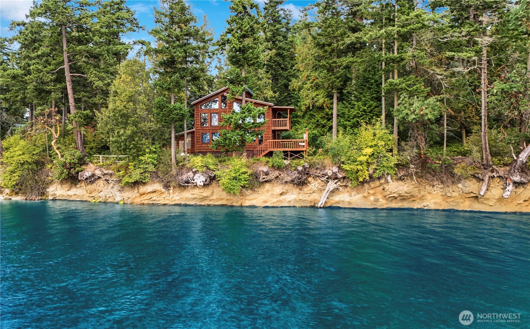 861 Griffith Point Road Nordland, WA 98358 - Photo 38 of 38 a view of a house with a yard