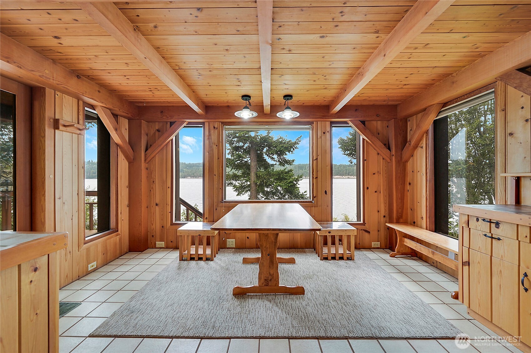 861 Griffith Point Road Nordland, WA 98358 - Photo 5 of 38 a living room with a large window