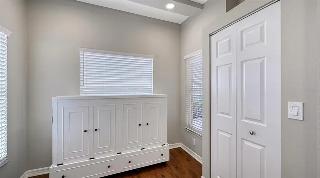 a view of a room with racks on the wall