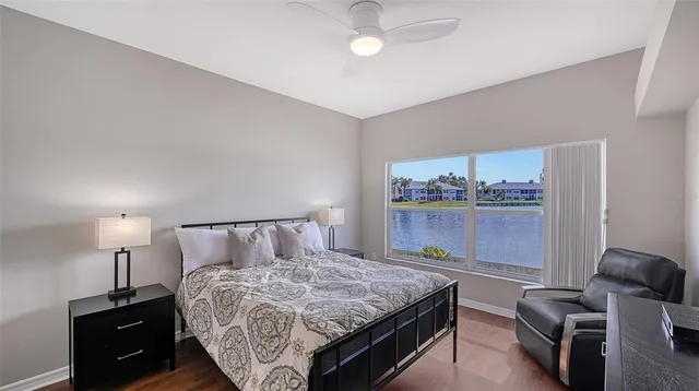 an aerial view of a house with a lake view