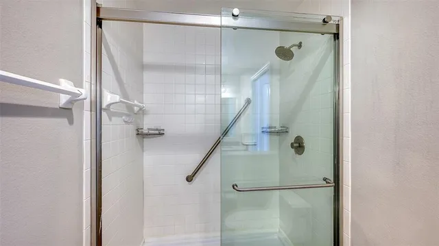 an aerial view of a city with a lake view