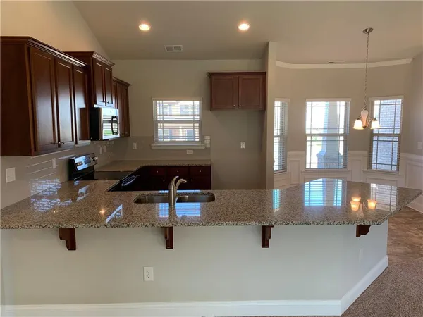 a lobby with furniture and windows