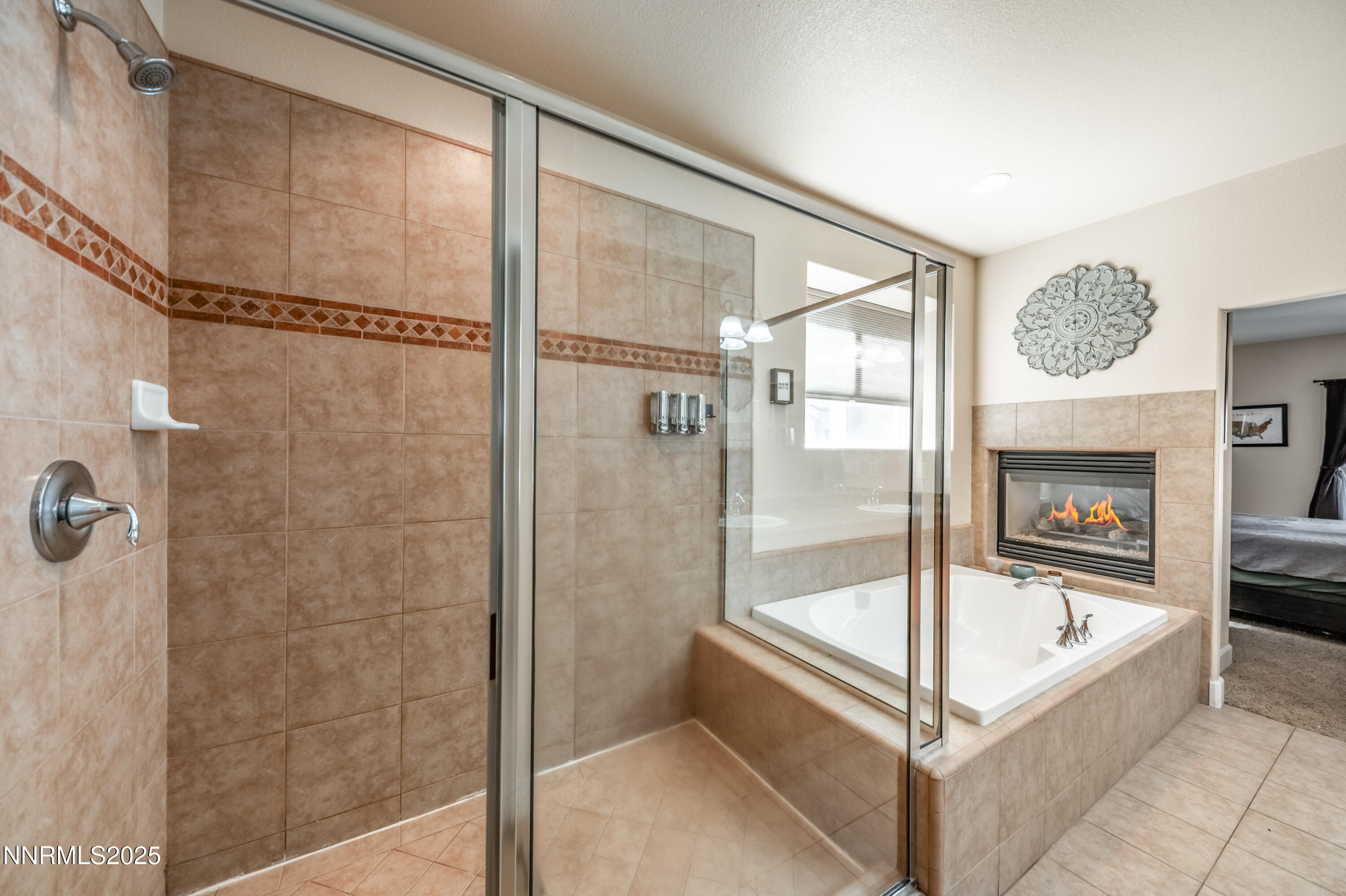 3715 Coastal Street Reno, NV 89512 - Photo 16 of 35 a bathroom with a tub and shower