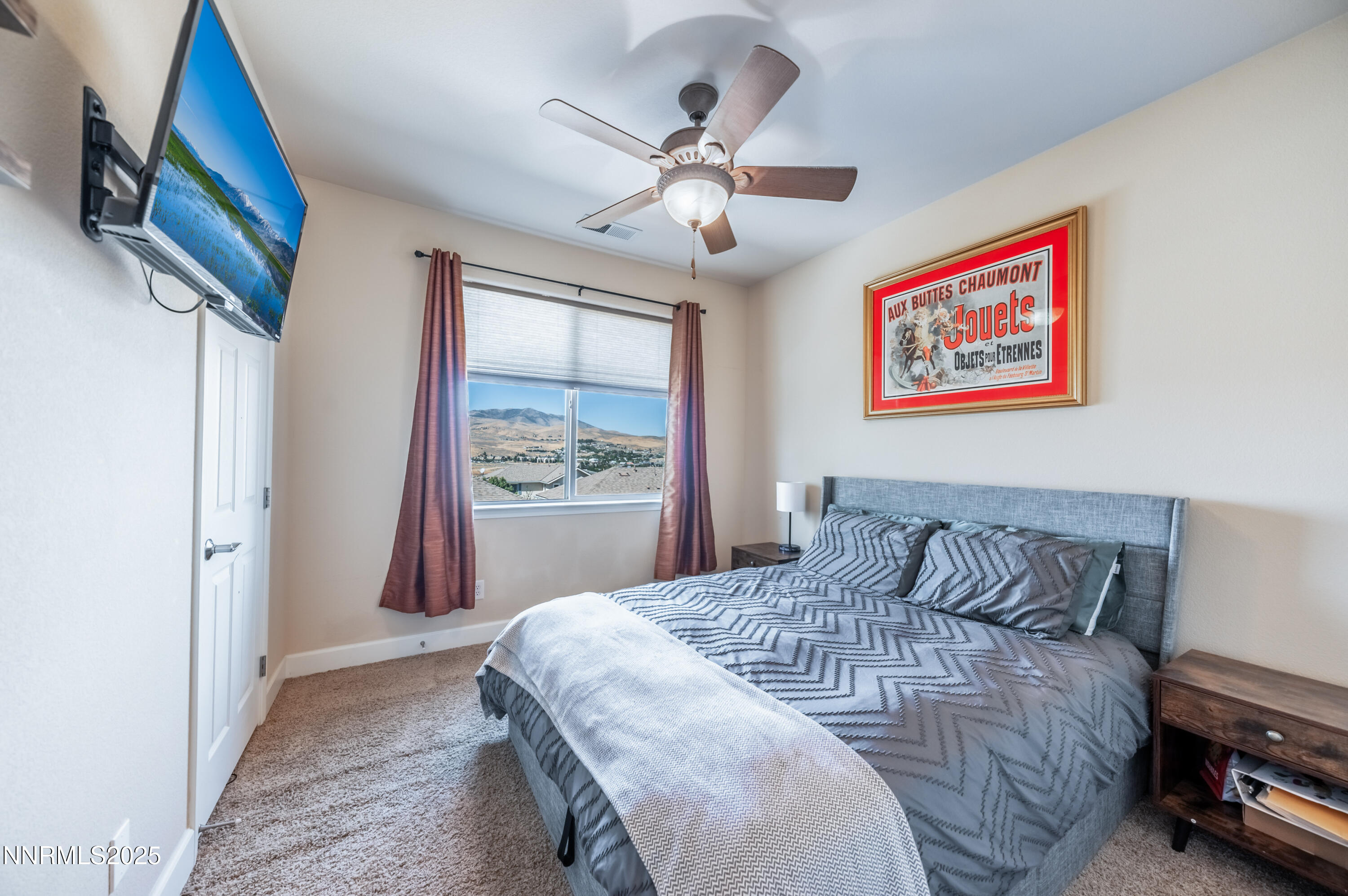 3715 Coastal Street Reno, NV 89512 - Photo 26 of 35 a bedroom with a bed and a painting on the wall