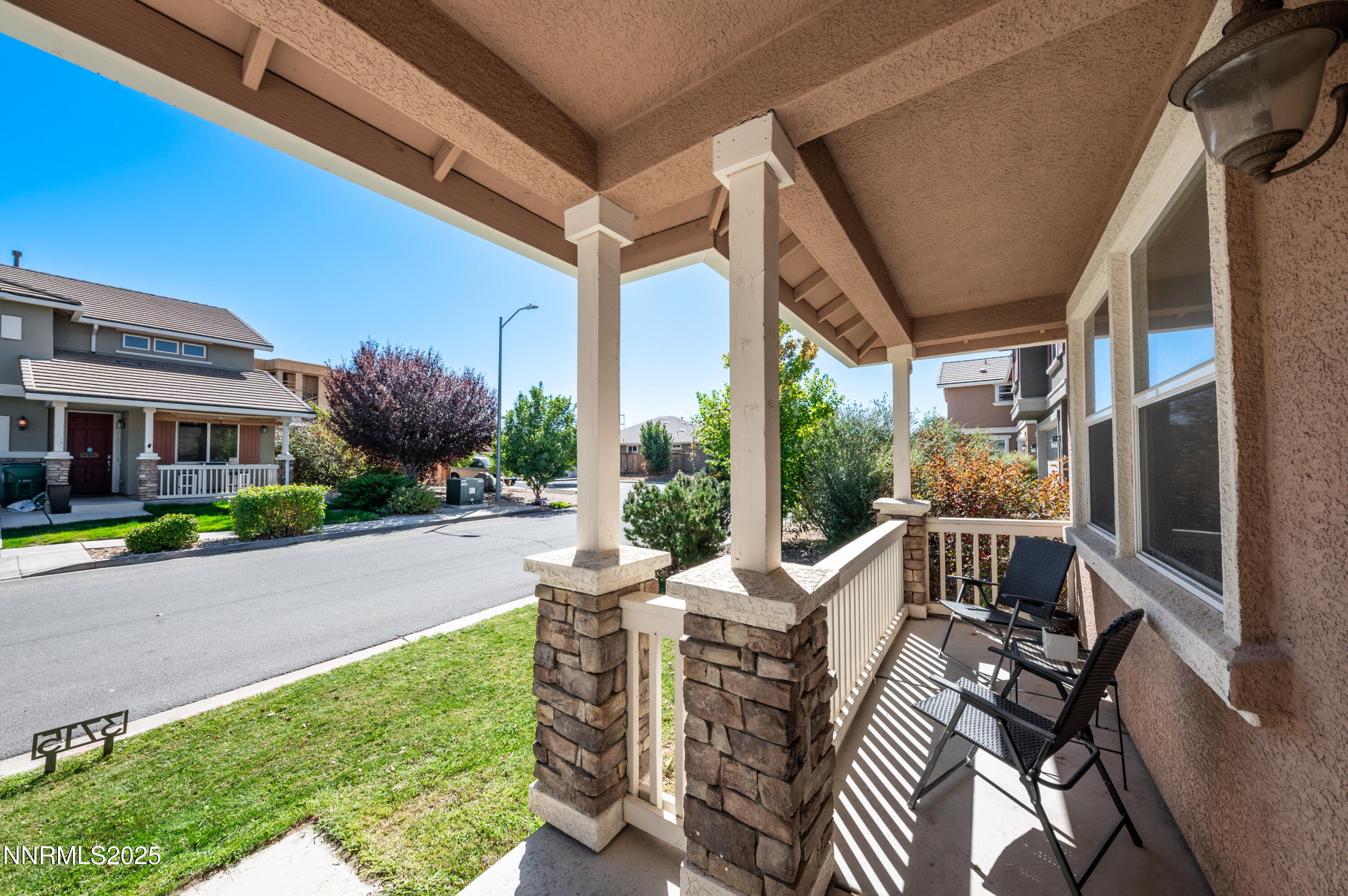 3715 Coastal Street Reno, NV 89512 - Photo 35 of 35 a view of a patio with table and chairs and potted plants