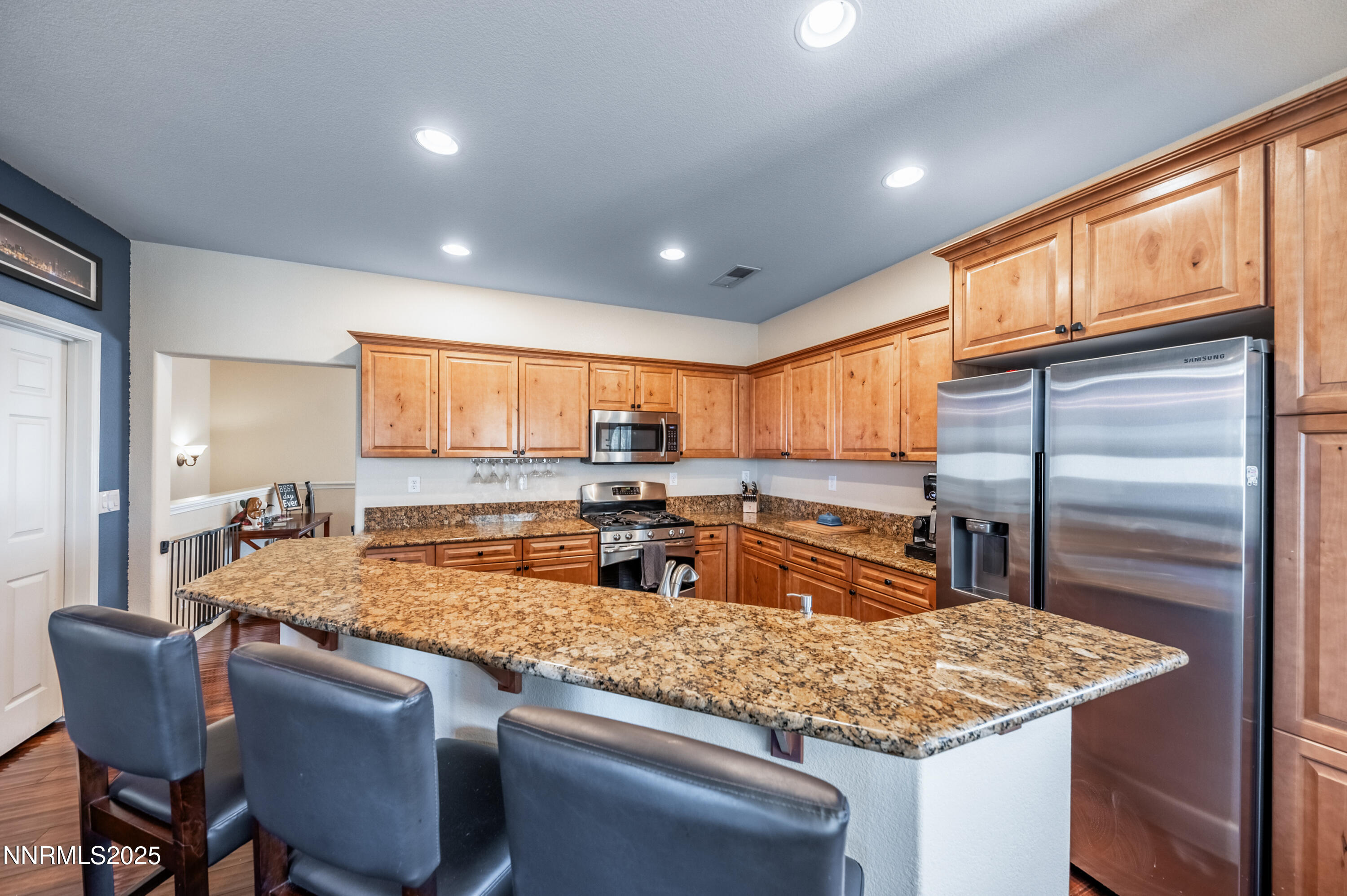 3715 Coastal Street Reno, NV 89512 - Photo 8 of 35 a kitchen with center island table and chairs