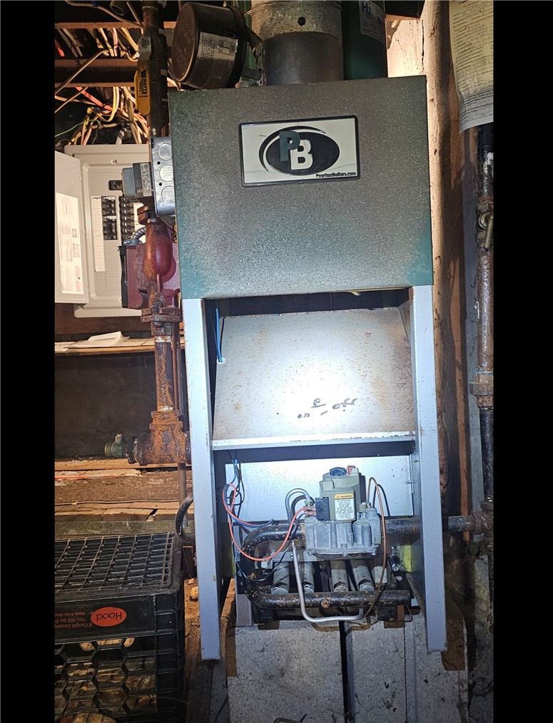 59 Division Street Woonsocket, RI 02895 - Photo 26 of 29 Side of Natural Gas Boiler