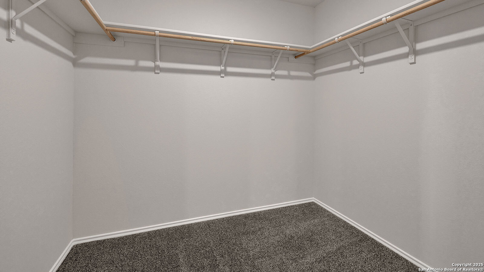 322 Hodges Street Maxwell, TX 78656 - Photo 26 of 34 a view of a room with racks on the wall