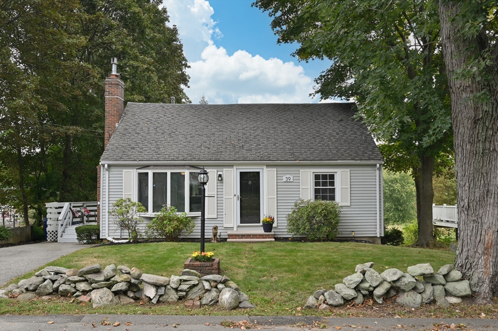 39 Wadsworth Street Danvers, MA 01923 - Photo 1 of 35 a view of a house with backyard and garden